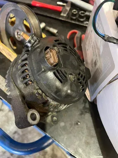 Alternator removed from a vehicle for testing and replacement