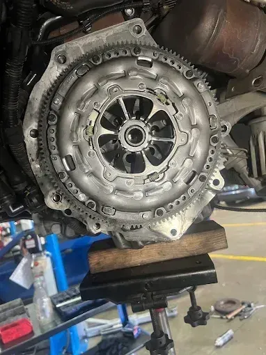 Clutch and flywheel on a vehicle during a clutch replacement
