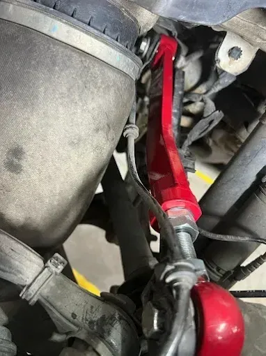 Suspension components under a vehicle during a suspension inspection